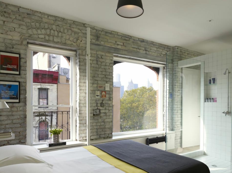 chambre coucher murs en briques apparentes