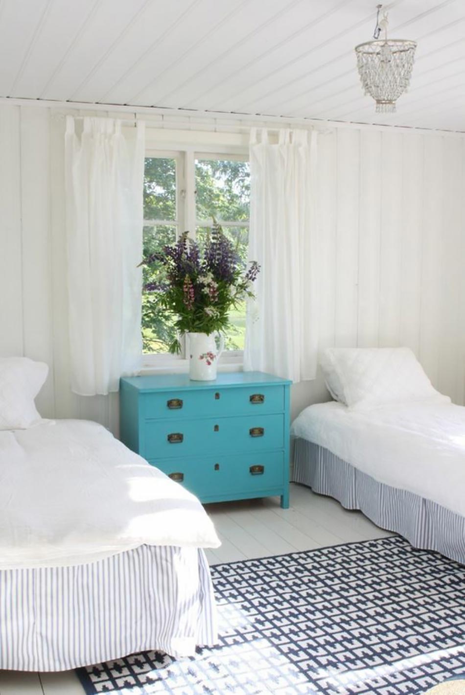 Chambre d'appoint aux lits séparés