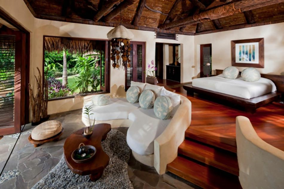 Suite de prestige pour deux à Laucala complexe hôtelier bois exotique destination de reve fidji