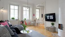 Salon spacieux en gris et blanc aux petits meubles design