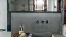 lavabo et mur en béton brut