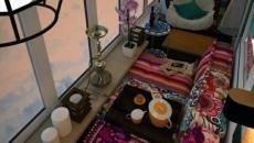 Espace détente pour lire, écouter de la musique ou recevoir coin lecture balcon vitré