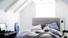 Chambre aménagé dans les combles en blanc et bleu ambiance sobre en blanc chambre sous toit