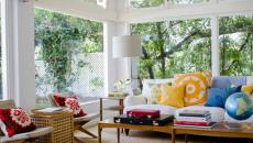 Véranda moderne au mobilier design ambiance soleil véranda aménagée meublée salon de jardin
